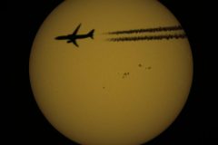 Sonne-mit-Flugzeug